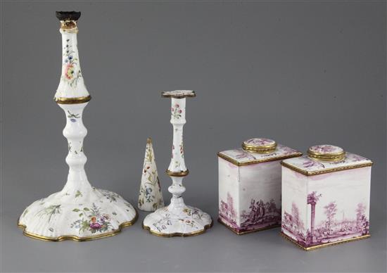 A pair of South Staffordshire enamel tea caddies and covers, and two similar candlesticks, late 18th century, 6.25in. and 10in., candle
